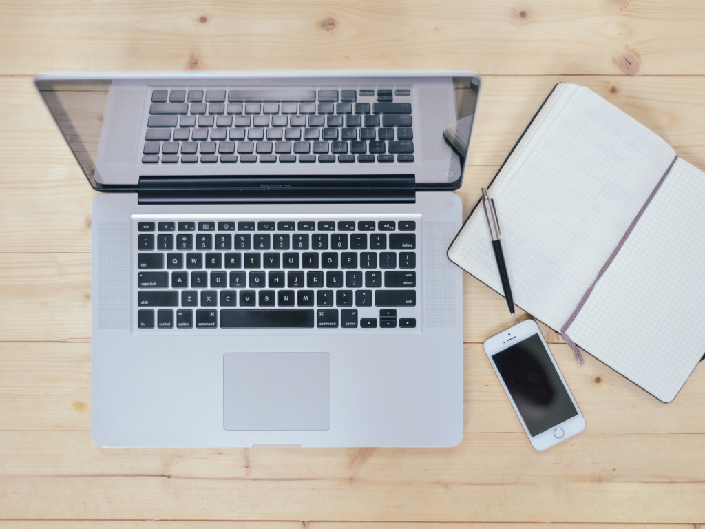 Computer and phone on a desk